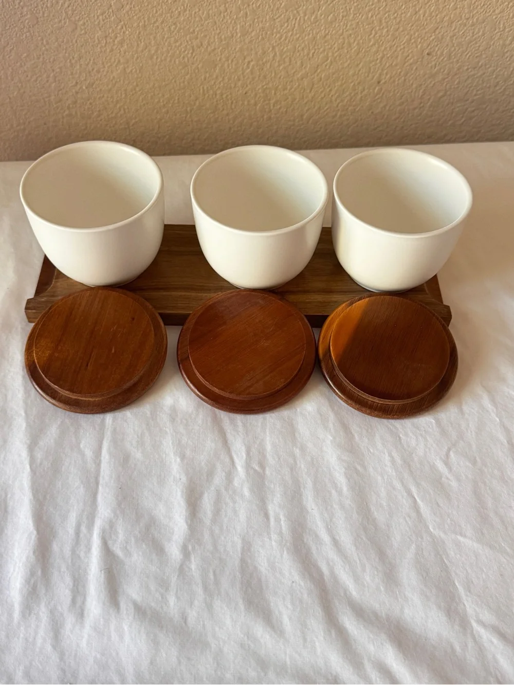 White Ceramic Condiment Trio with Wooden Lids and Tray